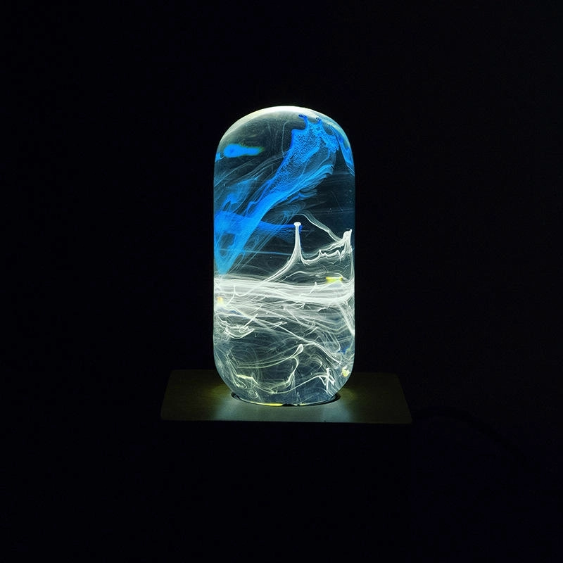 Creative Transparent Poly Resin Clear Aesthetics Blue Atmosphere Directional Radian Lighting LED Lamp Bulb With Socket